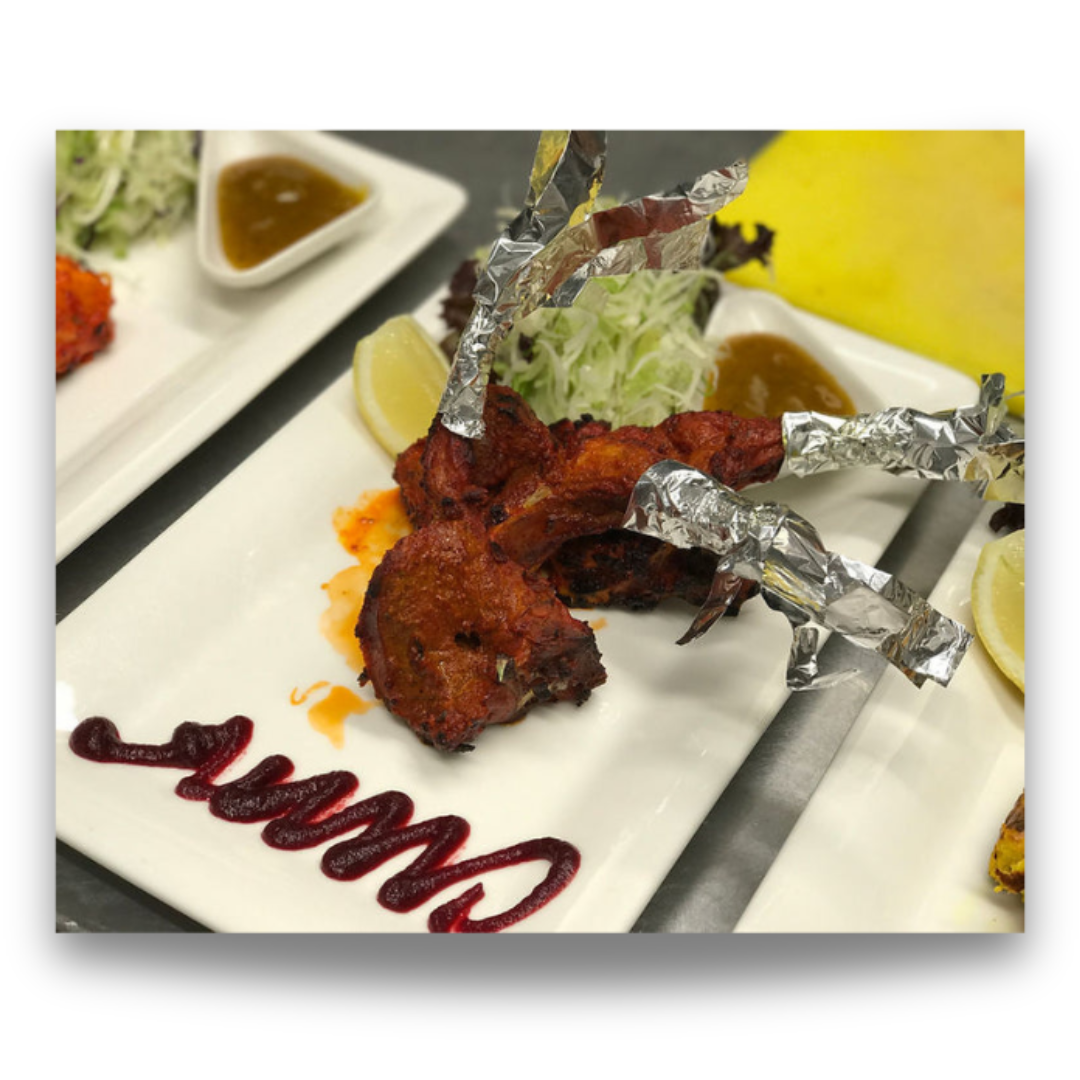 Marinated pork dish cooked with authentic Indian spices at Coriander Lounge, Southampton